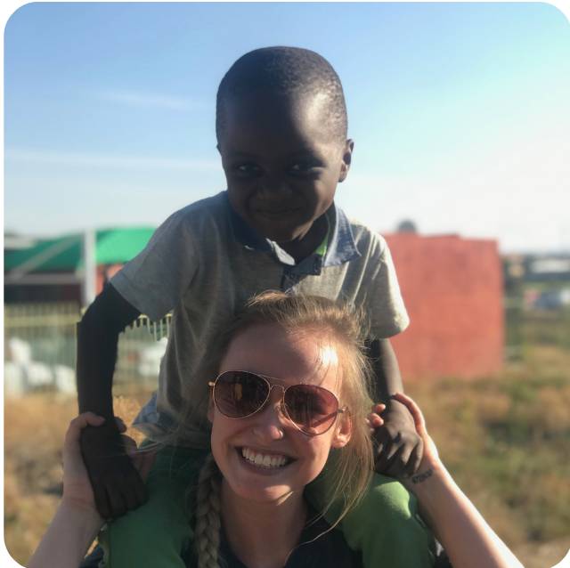 Student with local child during study abroad trip in Namibia